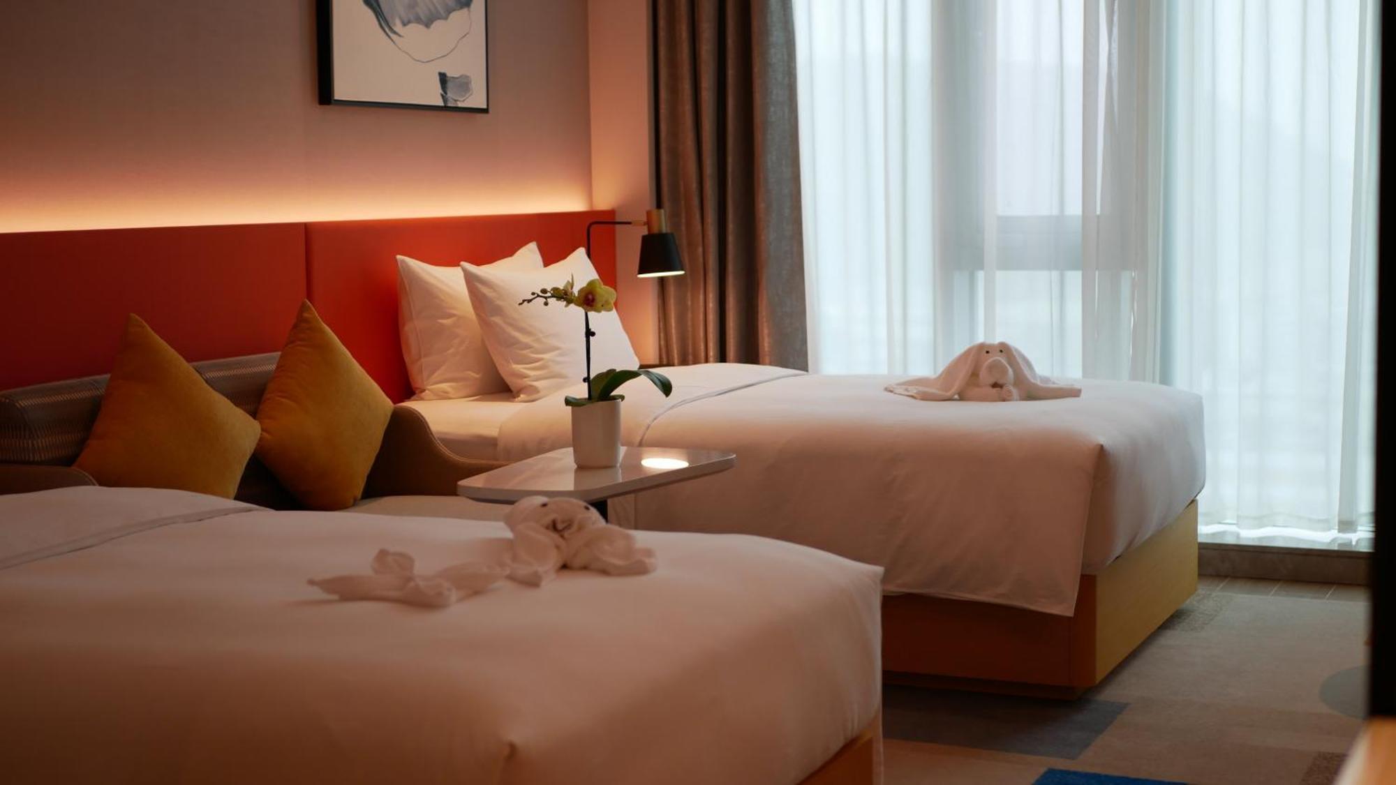 Hilton Garden Inn Shenzhen Baoan Huaide Exterior foto
